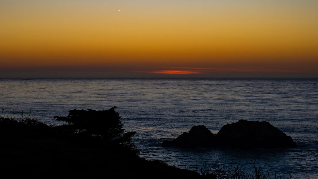 3840x2160 大海 石头 日落 地平线 深色壁纸 背景4k uhd 16:9